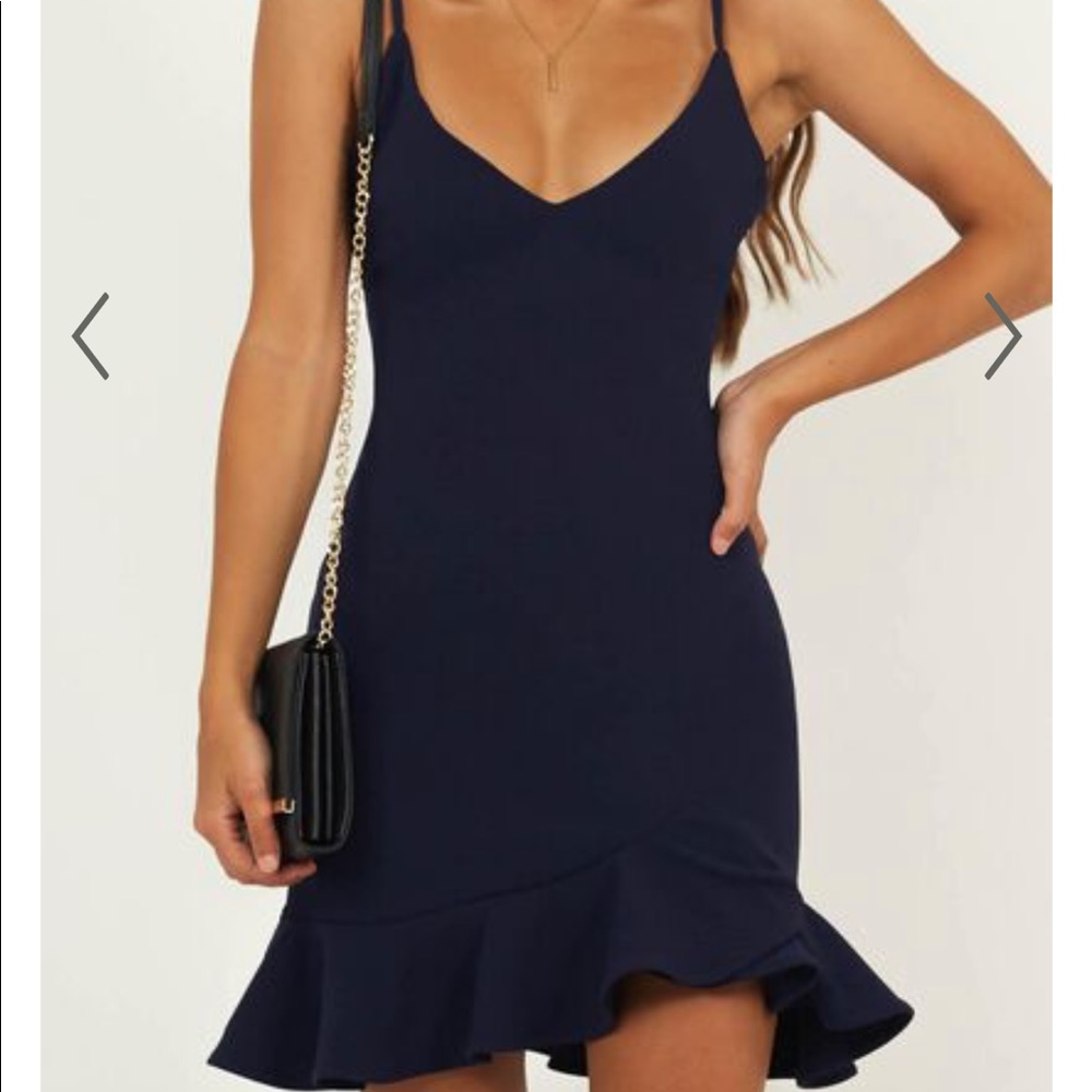 navy ruffle bottom dress